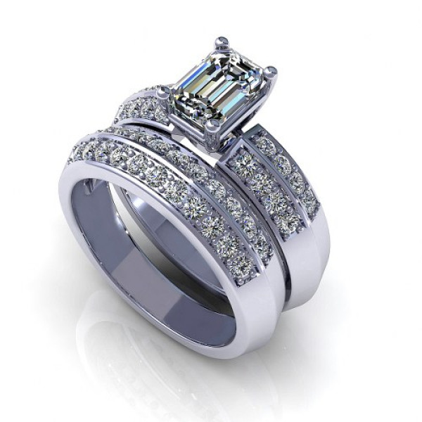 1.15CT emerald and round cut diamonds bridal set