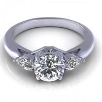0.65CT round and pear cut diamonds three stone ring